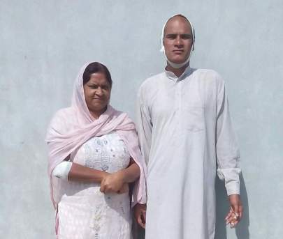 Before: Pastor Charanjit Singh and wife Elizabether after the attack last year.