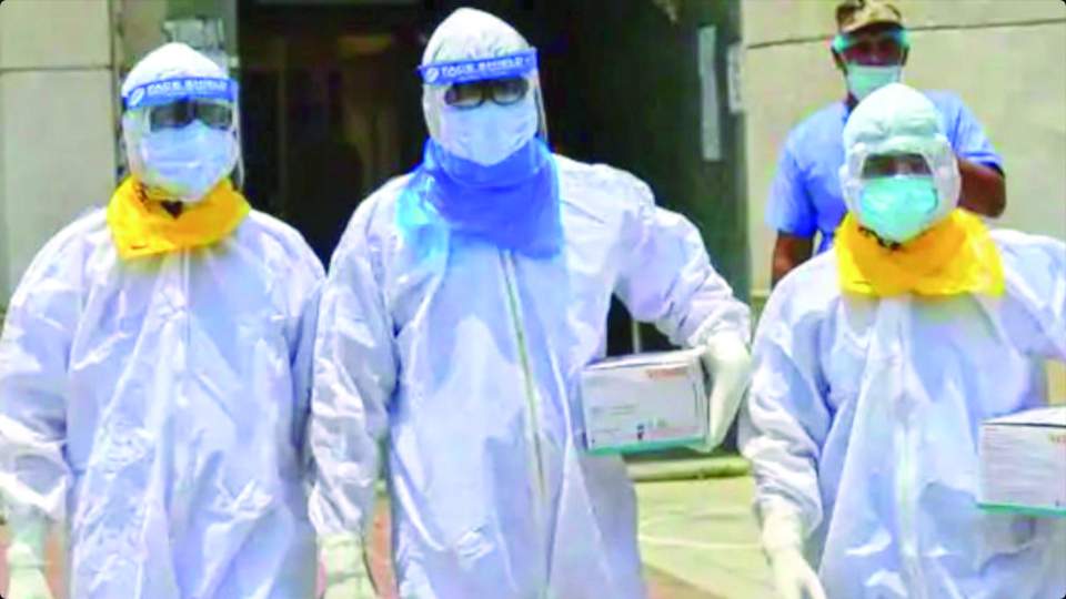 Medical staff at the COVID Care Center in their protective hazmat suits.