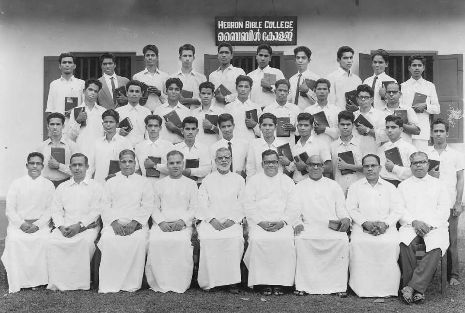 Pastor K.E. Abraham (center) with students and faculty in the late 1950s.