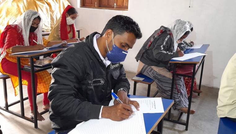 Mask mandates are followed in class at Gujarat Bible Training Center.