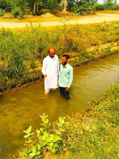 Baptism of a new believer in northwest India. New Christians are often targeted for persecution by radical groups, especially in states with anti-conversion laws.