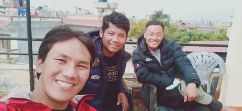 Evangelist Phendey Gurung, missionary to the Dolpo people of north Nepal, before the accident, with young men who have recently come to Christ.
