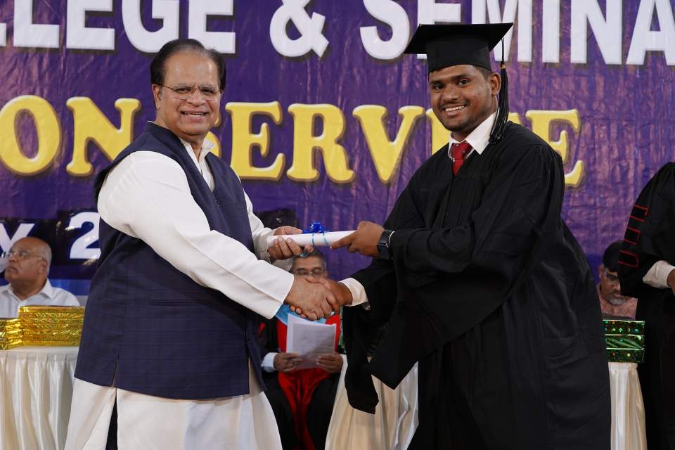 IGO President Valson Abraham, also president of IBC, presented diplomas to the men and women graduates.