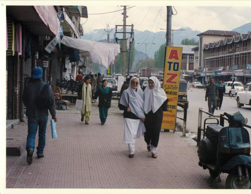 Muslim woman buying at the marketplace.