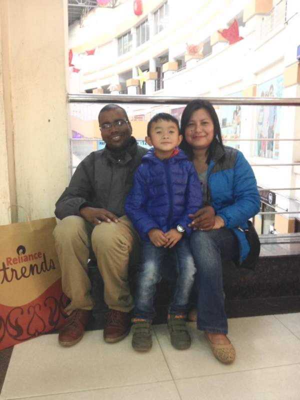 Pastor Pradeep Kumar with his wife, Merilo, and son, Joel.