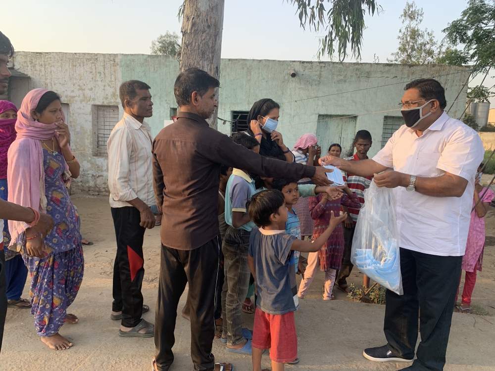 Masks being distributed by evangelists to slum residents in Ludhiana, Punjab.
