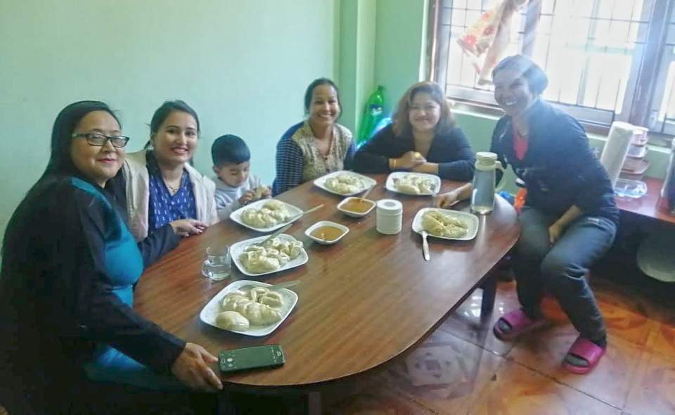 Rodha Lama (r) hosts some Nepali Christian women in her Kathmandu home.
